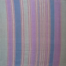 Purple, grey, and teal, muted color and finely woven design.